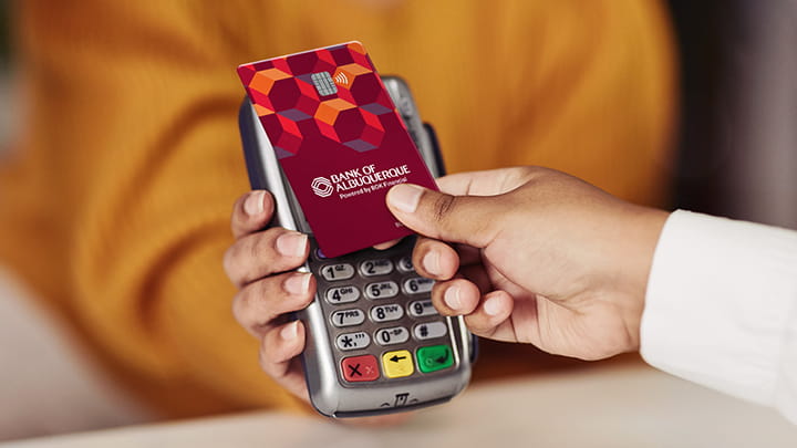 Business debit card being used for a purchase